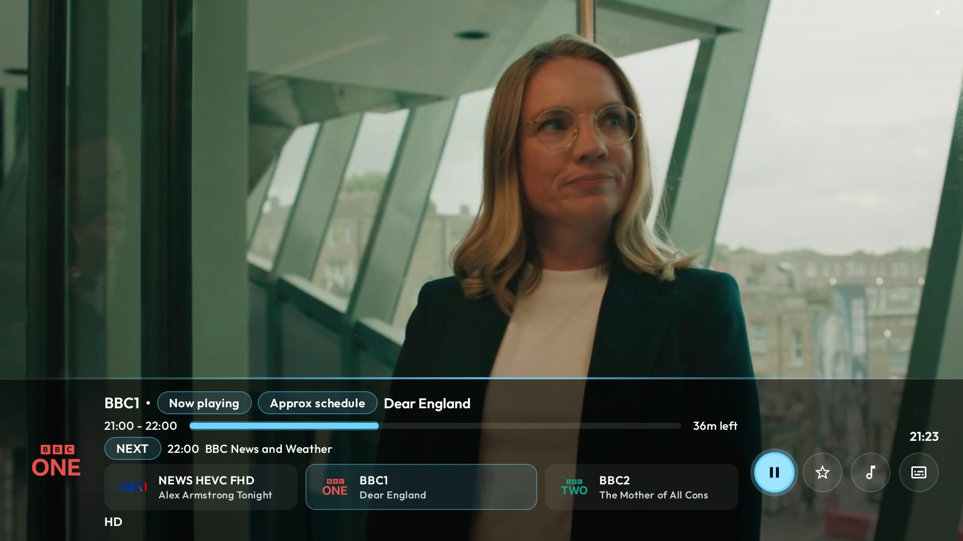 TiviGlass playback controls shown over video on Fire TV